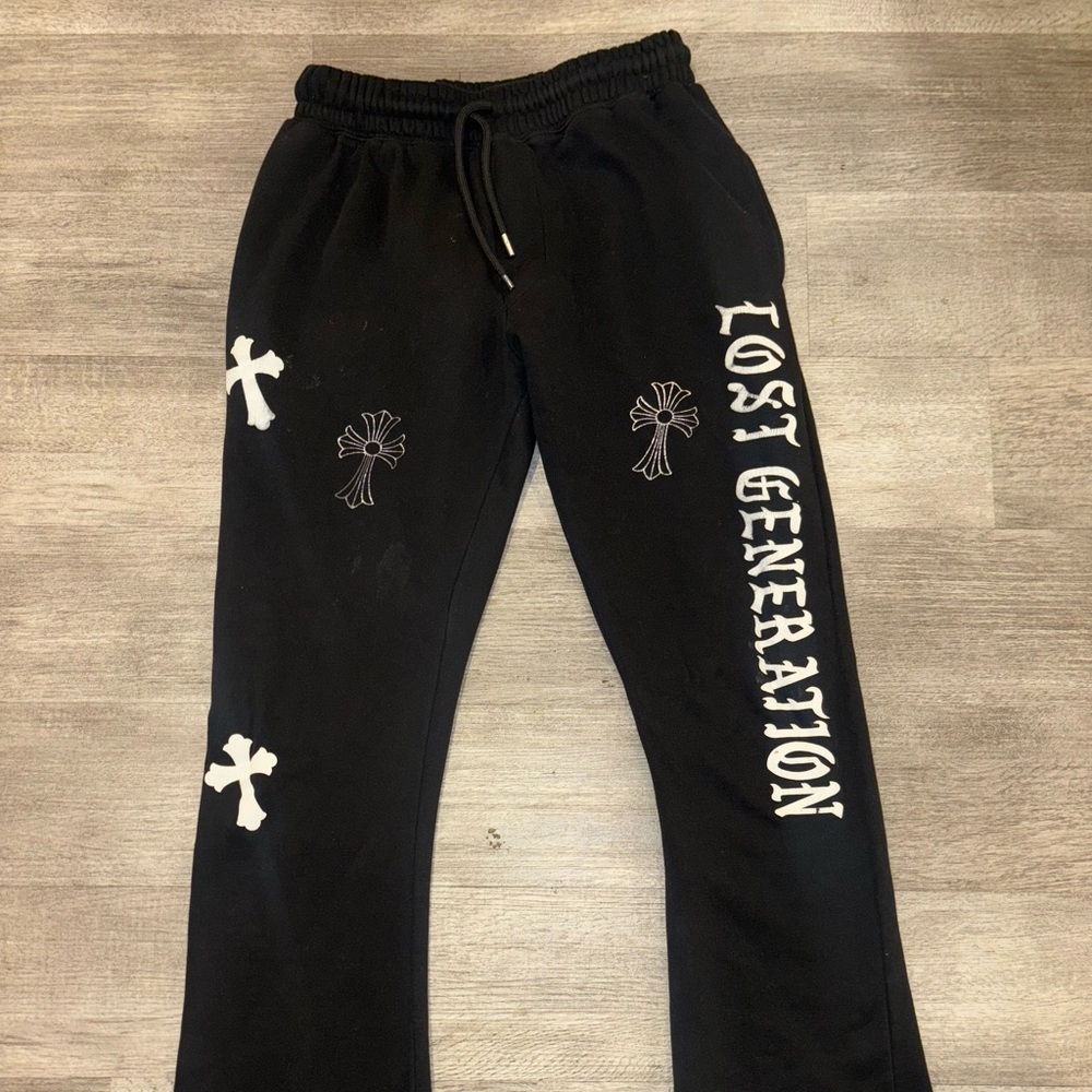 Black Sweatpants with White Cross and Text Design